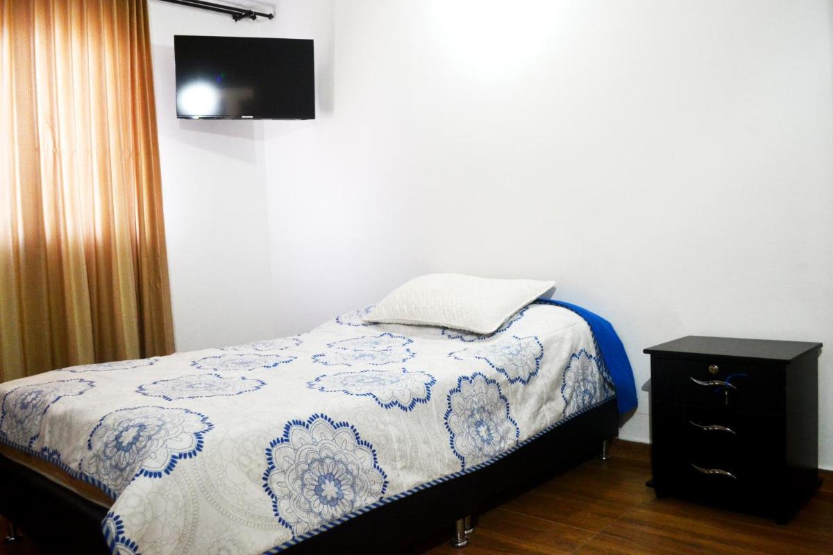bonita y cómoda habitación