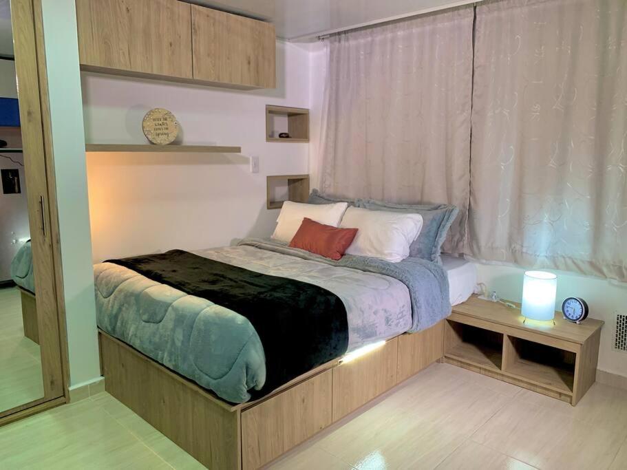 Práctico Loft cerca al aeropuerto y terminal 301